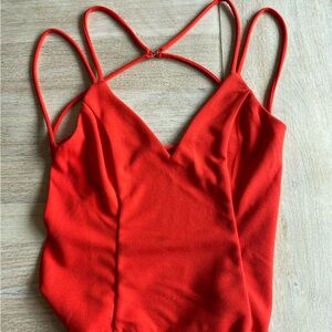 Lulu’s Vibrant Red Hot Strappy Bodysuit